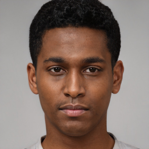 Neutral black young-adult male with short  black hair and brown eyes