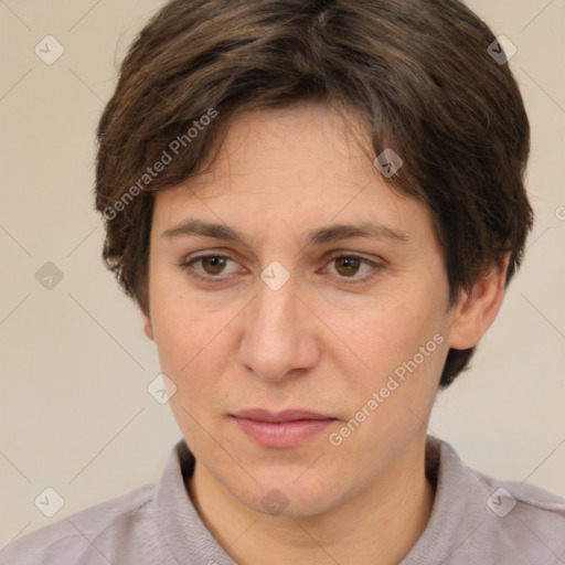 Joyful white adult female with short  brown hair and brown eyes