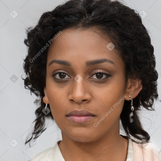 Neutral black young-adult female with long  brown hair and brown eyes