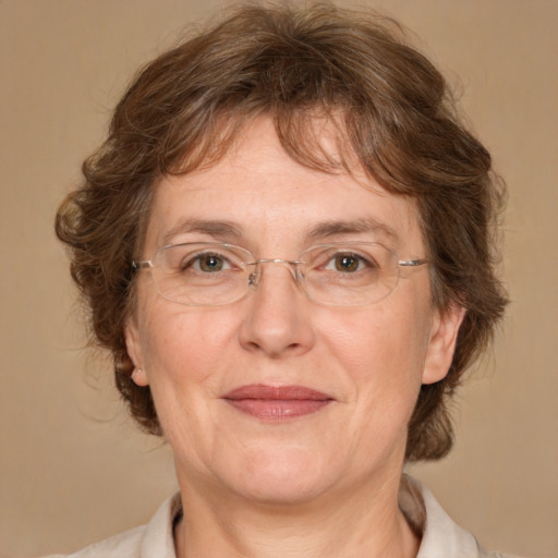 Joyful white middle-aged female with medium  brown hair and brown eyes