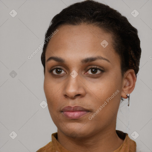 Neutral black young-adult female with short  brown hair and brown eyes