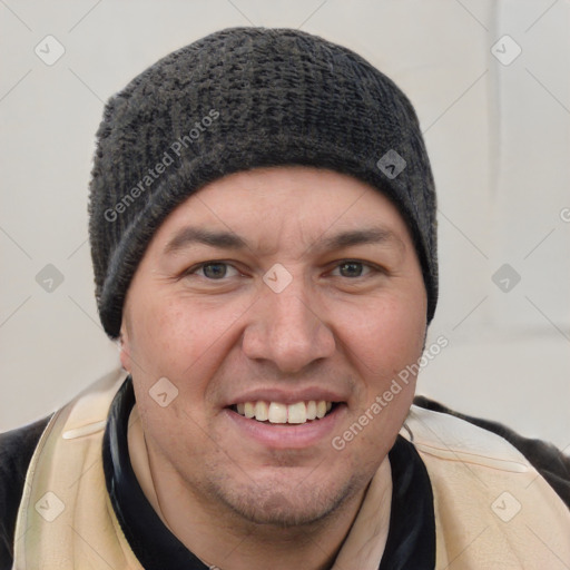 Joyful white young-adult male with short  black hair and brown eyes