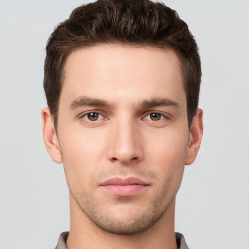 Neutral white young-adult male with short  brown hair and brown eyes