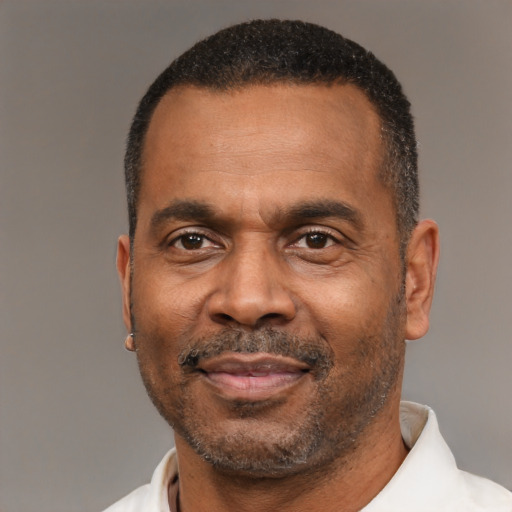 Neutral black adult male with short  black hair and brown eyes