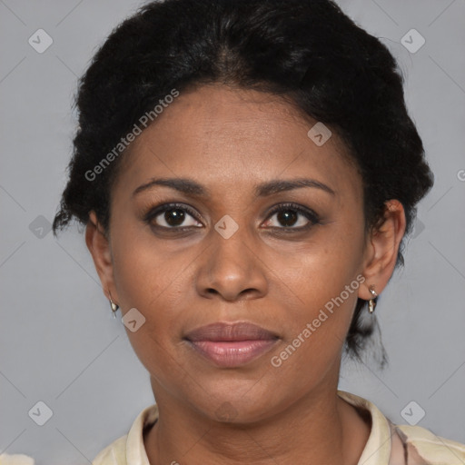 Joyful latino young-adult female with short  black hair and brown eyes