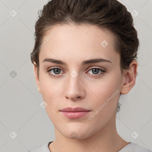 Neutral white young-adult female with short  brown hair and brown eyes