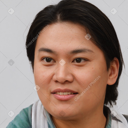 Joyful asian young-adult female with medium  brown hair and brown eyes