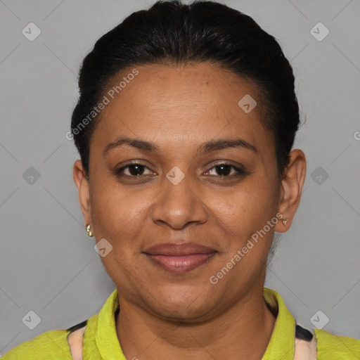 Joyful black adult female with short  brown hair and brown eyes