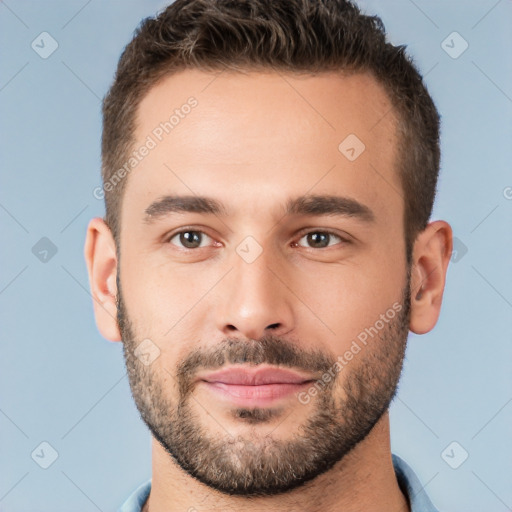 Joyful white young-adult male with short  brown hair and brown eyes