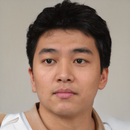 Neutral asian young-adult male with short  black hair and brown eyes