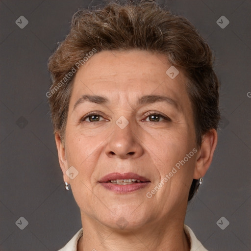 Joyful white adult female with short  brown hair and brown eyes