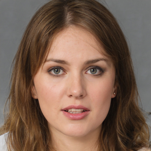 Neutral white young-adult female with long  brown hair and brown eyes