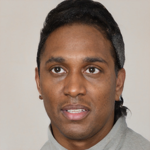 Neutral black young-adult male with short  black hair and brown eyes
