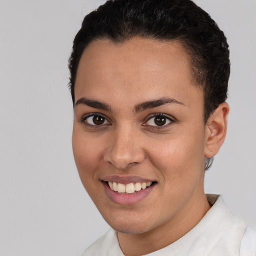 Joyful white young-adult female with short  brown hair and brown eyes