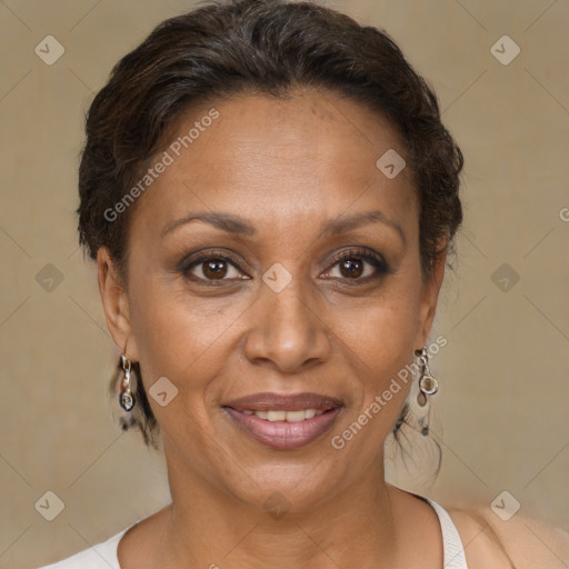 Joyful black adult female with short  brown hair and brown eyes