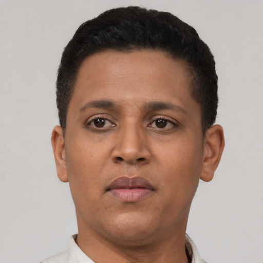 Neutral latino young-adult male with short  brown hair and brown eyes