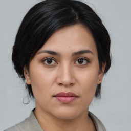 Neutral asian young-adult female with medium  black hair and brown eyes