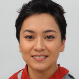 Joyful asian young-adult female with short  brown hair and brown eyes