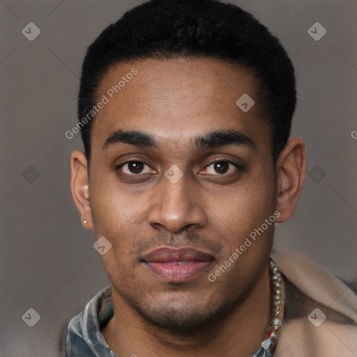 Joyful black young-adult male with short  black hair and brown eyes