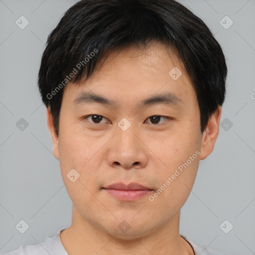 Neutral asian young-adult male with short  black hair and brown eyes