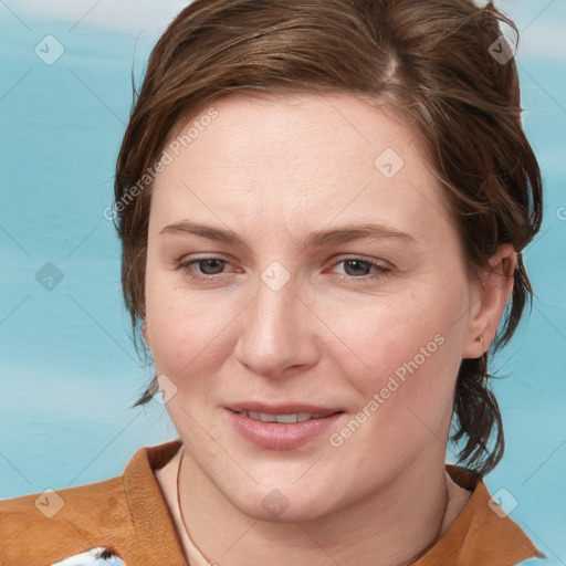 Joyful white young-adult female with medium  brown hair and blue eyes