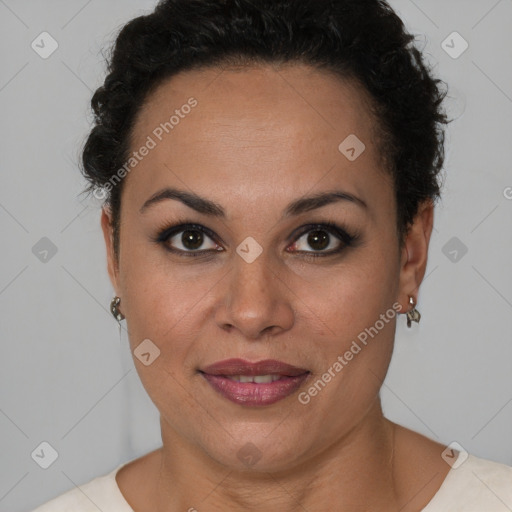 Joyful black adult female with short  brown hair and brown eyes