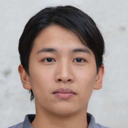 Neutral asian young-adult male with short  black hair and brown eyes
