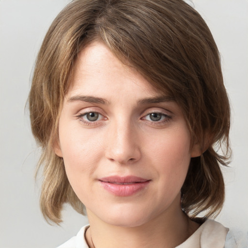 Neutral white young-adult female with medium  brown hair and grey eyes