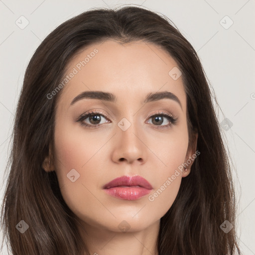 Neutral white young-adult female with long  brown hair and brown eyes