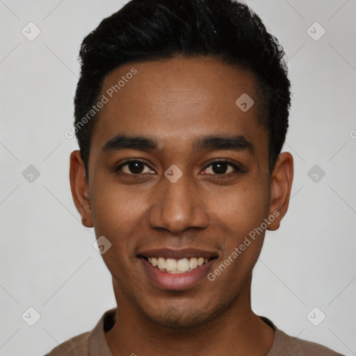 Joyful latino young-adult male with short  black hair and brown eyes