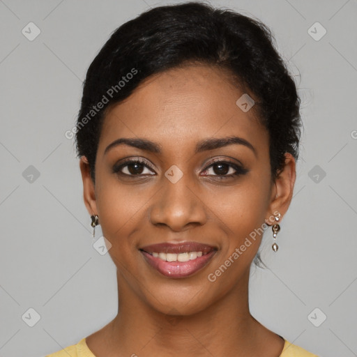 Joyful black young-adult female with short  black hair and brown eyes