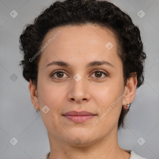 Joyful white adult female with short  brown hair and brown eyes