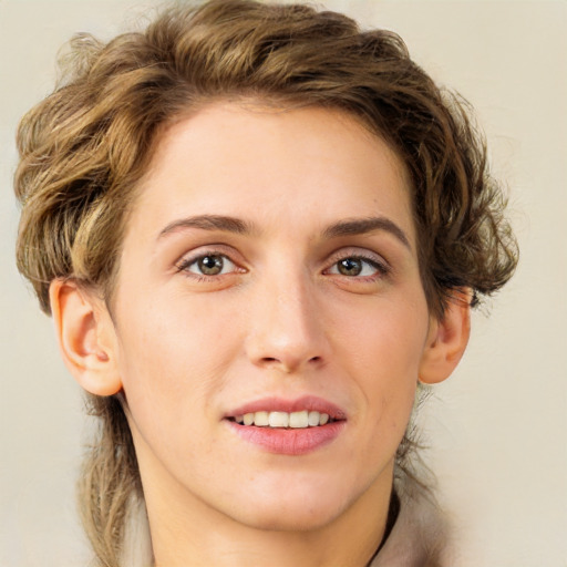 Joyful white young-adult female with medium  brown hair and green eyes