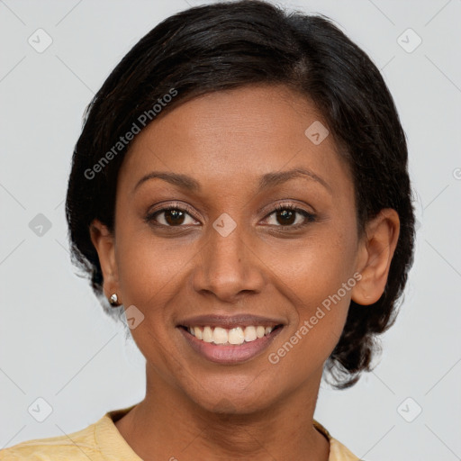 Joyful latino young-adult female with short  brown hair and brown eyes