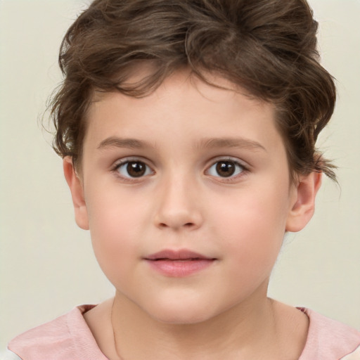 Joyful white child male with short  brown hair and brown eyes