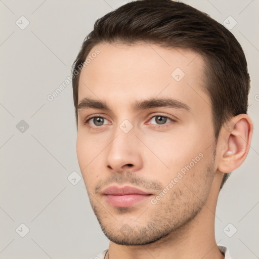 Neutral white young-adult male with short  brown hair and brown eyes