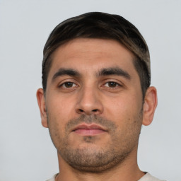 Neutral white young-adult male with short  brown hair and brown eyes