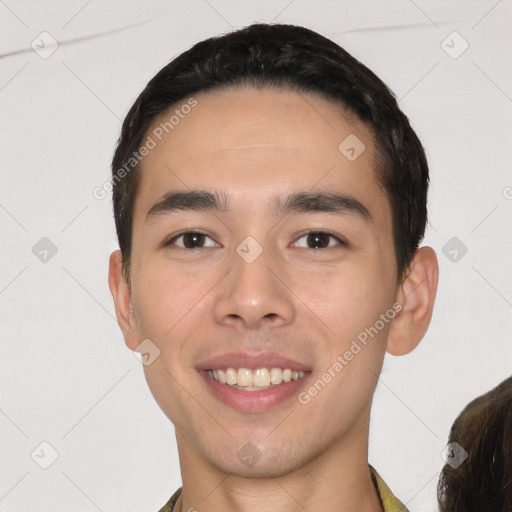 Joyful white young-adult male with short  black hair and brown eyes