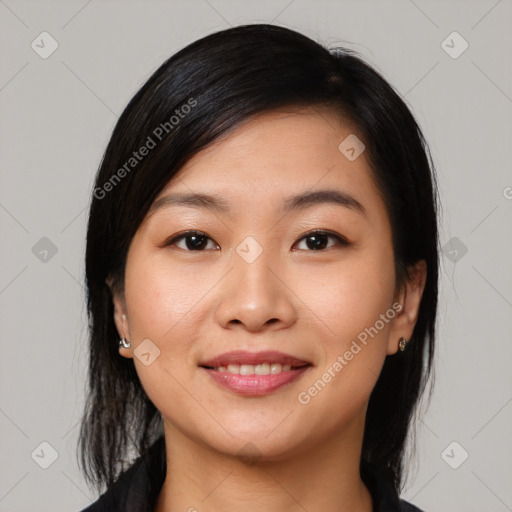 Joyful asian young-adult female with medium  black hair and brown eyes