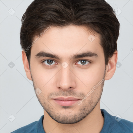 Neutral white young-adult male with short  brown hair and brown eyes