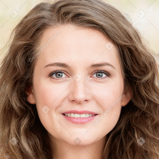 Joyful white young-adult female with long  brown hair and green eyes