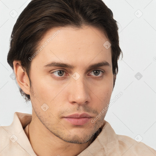 Neutral white young-adult male with short  brown hair and brown eyes