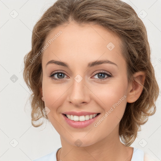 Joyful white young-adult female with medium  brown hair and green eyes