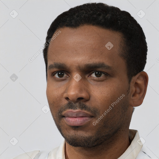 Neutral black young-adult male with short  black hair and brown eyes