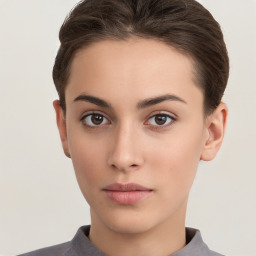 Neutral white young-adult female with short  brown hair and brown eyes