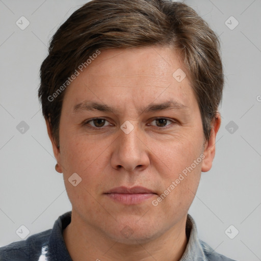 Joyful white adult male with short  brown hair and grey eyes