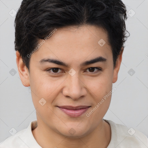 Joyful asian young-adult male with short  brown hair and brown eyes