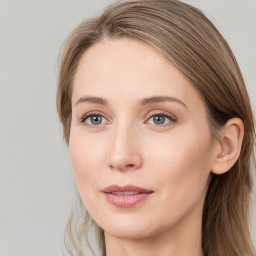 Neutral white young-adult female with long  brown hair and grey eyes