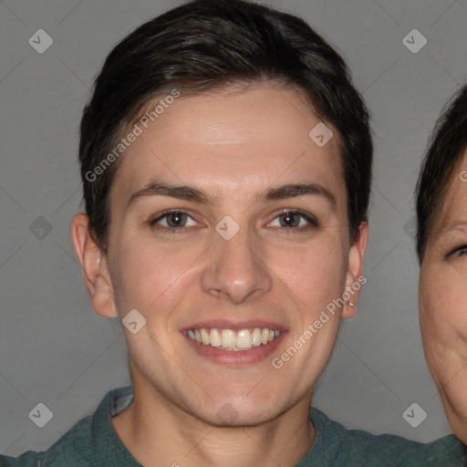 Joyful white young-adult female with short  brown hair and brown eyes