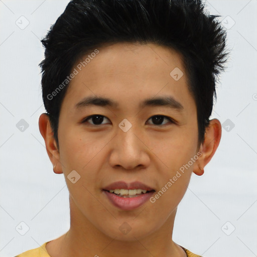 Joyful asian young-adult male with short  black hair and brown eyes